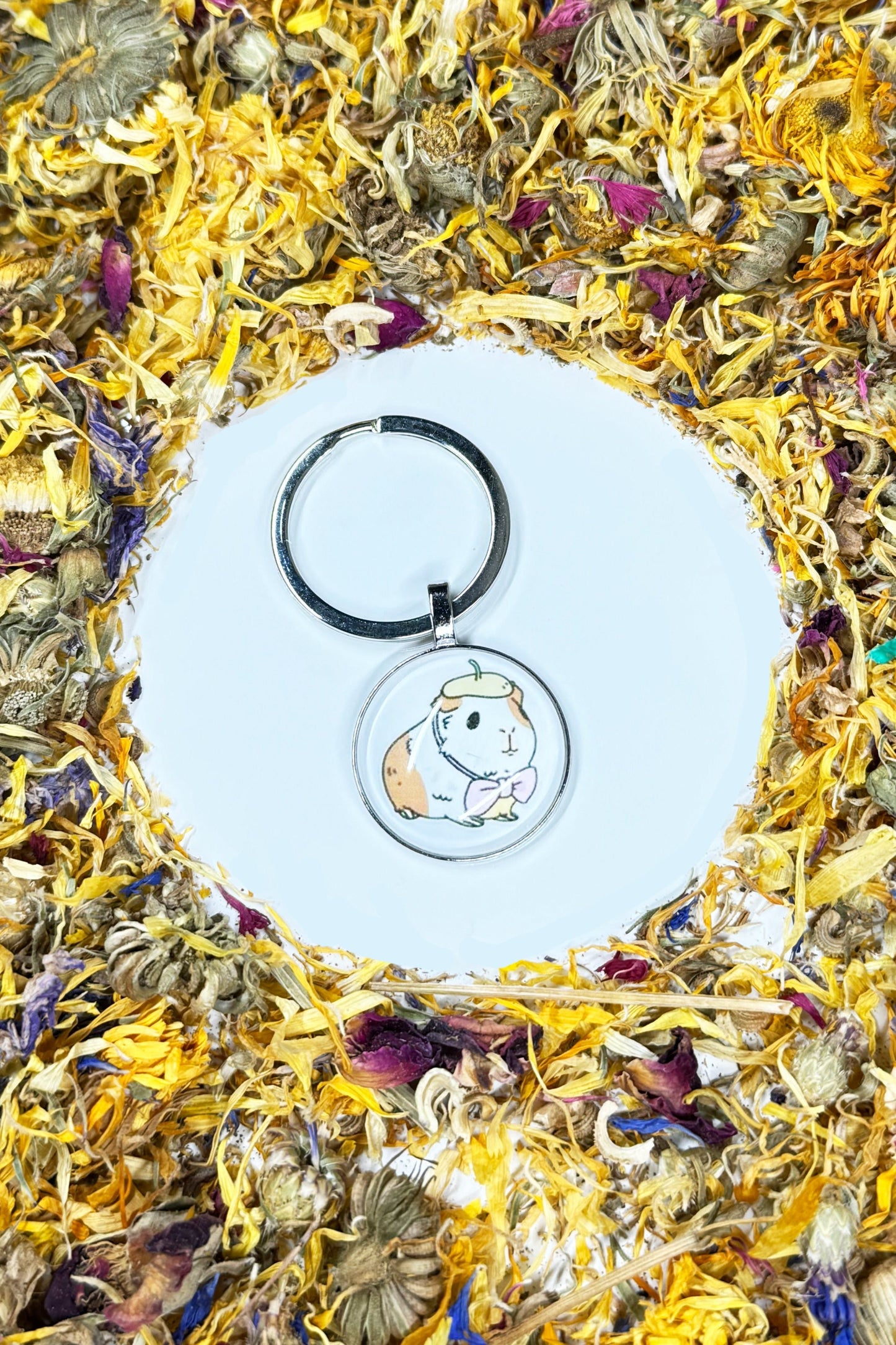 Moony Paw Guinea Pig Keychain – charming miniature guinea pig keychain for animal lovers; perfect for gifts or personal keepsakes, adds a pocket-sized piece of happiness to your day.