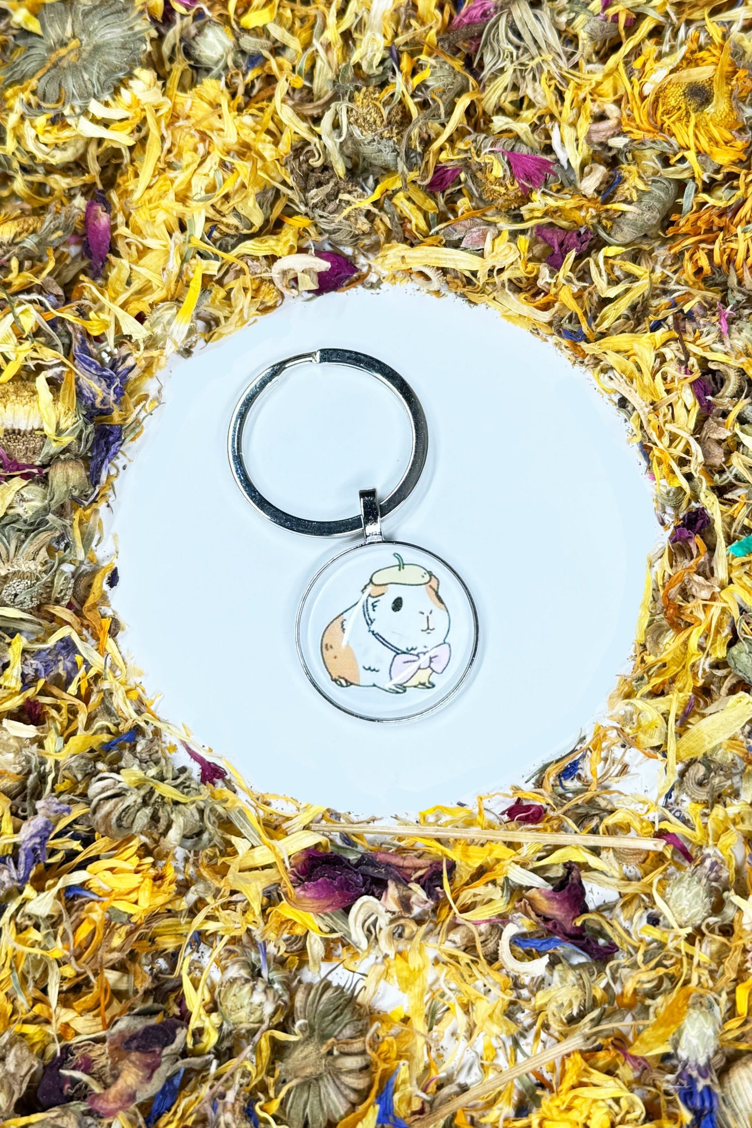 Moony Paw Guinea Pig Keychain – charming miniature keychain for animal lovers, perfect for gifts or personal keepsakes.