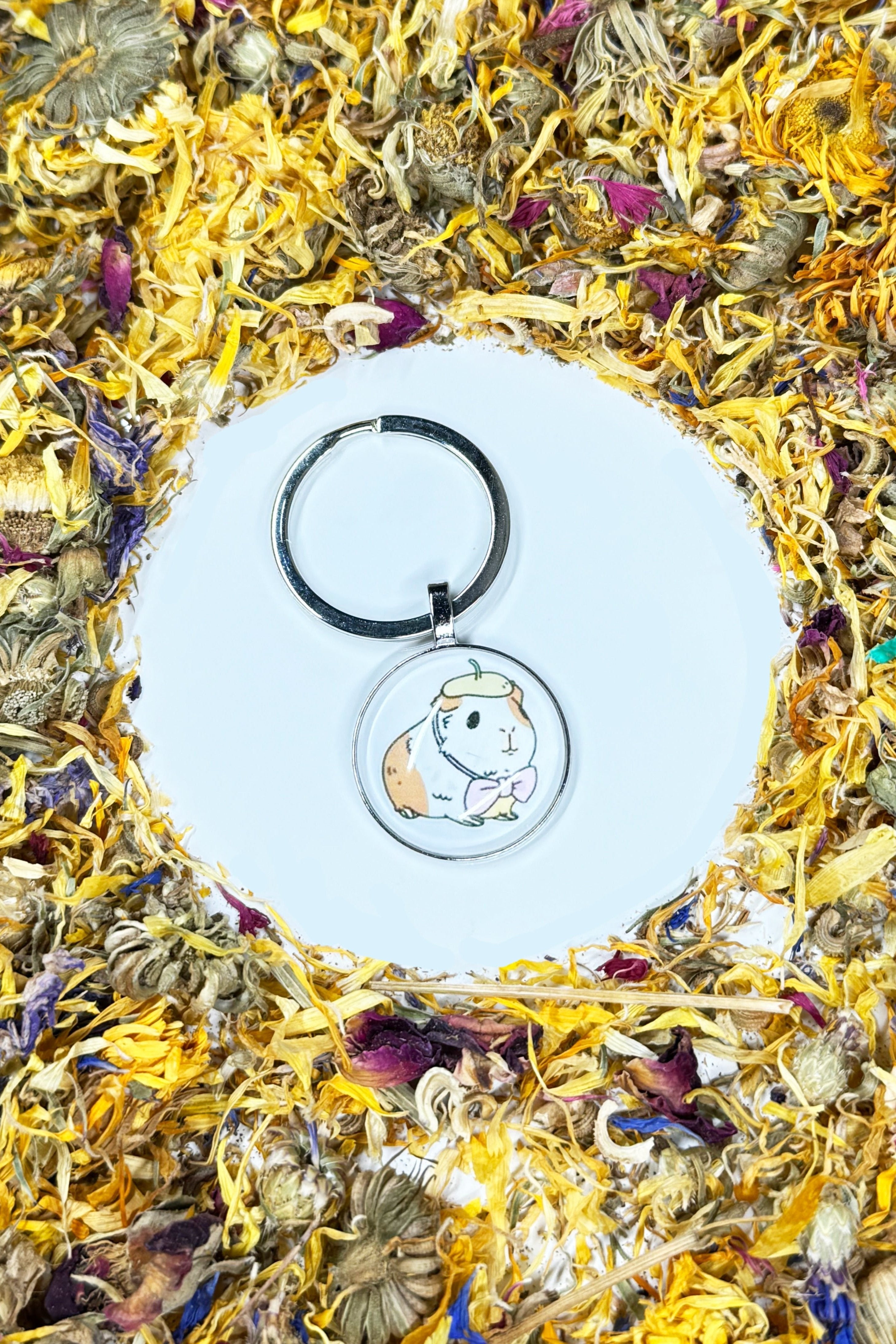 Moony Paw Guinea Pig Keychain – charming miniature keychain for animal lovers, perfect for gifts or personal keepsakes.