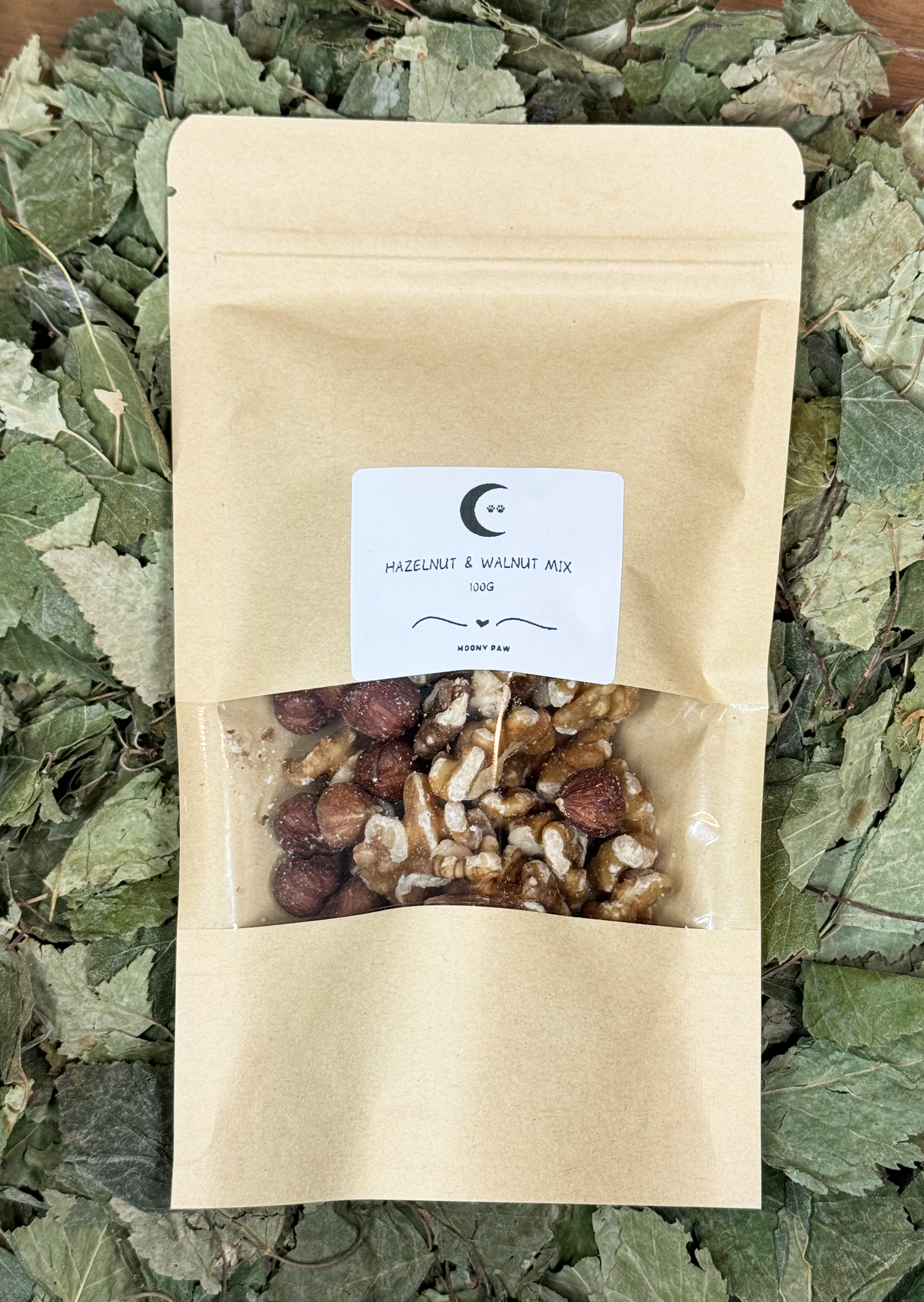 Moony Paw Hazelnut & Walnut Mix – nutritious snack for hamsters; rich in proteins, healthy fats, vitamins, and minerals; supports energy, muscle repair, skin, fur, and dental health; serve in moderation.